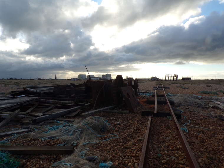 Remnants & power station under a stormy sky, Dungeness. Photograph © Mari French 2018